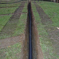 Drain section with drainage pipe - Ground Works - Quest Landscapes Isle of Man
